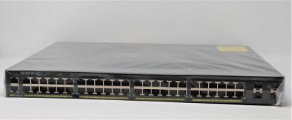 A boxed as new Cisco Catalyst 2960X-48LPS-L V06 Managed Switch (Box opened, UK power adaptor