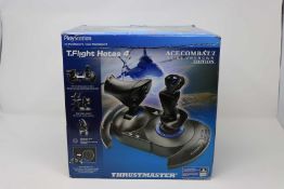 A pre owned boxed Thrustmaster T.Flight Hotas 4 PS4 Joystick - Ace Combat 7 Skies Unknown Edition (