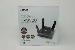 A boxed as new ASUS RT-AX92U AX6100 Tri-Band Gigabit Router (Box sealed).