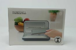 A boxed as new PhoneSoap 3 UV Smartphone Sanitizer & Universal Charger in Black (Box sealed).