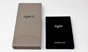 A boxed as new Light Phone II TLP202 in Grey (Box sealed) and a boxed as new Light Phone