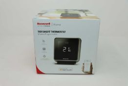 A boxed as new Honeywell Home T6R Wireless Programmable Thermostat with hot water control in