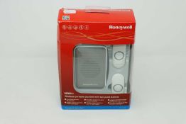 A boxed as new Honeywell Series 3 DC311NBS Wireless Plug-in Doorbell with push button in White (