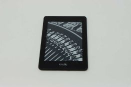 A pre-owned Amazon Kindle Paperwhite 4 (PQ94WIF) e-reader in Black.
