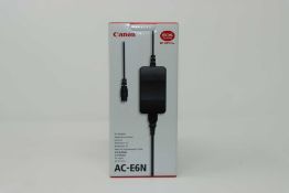 A boxed as new Canon AC-E6N Adaptor.