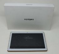 A boxed pre-owned YOTOPT K107 16 GB Tablet in Gold, with usb charging cable. Cosmetic damage to