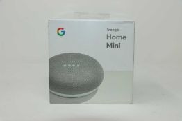 A boxed as new Google Home Mini GA00210-UK in Chalk (Box sealed, slight cosmetic damage to box)