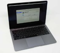 A pre-owned Apple MacBook Air 13