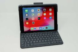 A pre-owned Apple iPad 9.7