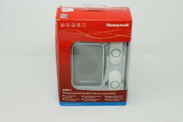 A boxed as new Honeywell Series 3 DC311NBS Wireless Plug-in Doorbell with push button in White (