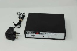 A pre-owned Whozz Calling 2 Deluxe Caller ID Interface (boxed with power supply and manual