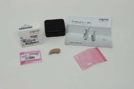 An as new Signia Contrast S+ Hearing Aid in Beige (REF: 10949268).