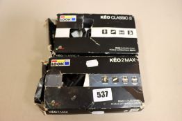 Two boxed LOOK biking pedals to include one LOOK keo classic 3 road clipless pedals and one LOOK keo