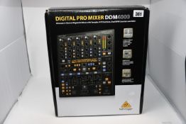 One boxed Behringer Digital Pro Mixer DDM4000.