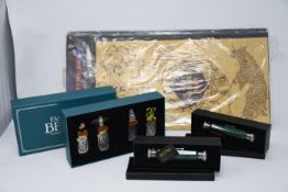 Four Harry Potter The Marauder's Map (Authentic prop replicas), two Deluminators and one box of