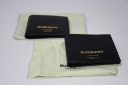 Two as new Burberry wallet (BE8:111798:A1189).