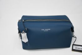 Two as new Ted Baker rubber washbags in navy.