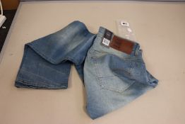 One as new G-Star Raw 3301 Loose jeans. Size W31 L36.
