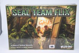 Two boxed as new Wizkids Seal Team Flix board games.