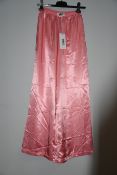One as new Maison Margiela pink long trousers size 38 (S32KA0607).