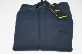 One man's as new Hugo Boss Skarley track top in dark blue (XL).
