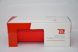 One boxed as new TB12 vibrating pliability roller.