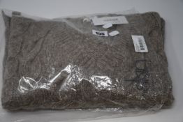 One lady's as new Skin Abrielle Sweater in sand (M).