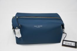 Three as new Ted Baker rubber washbags in navy.