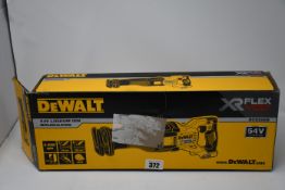 One boxed DeWalt DCS389N 54V XR FlexVolt reciprocating saw.