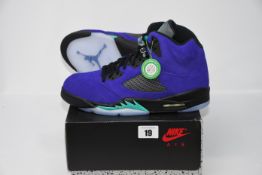 One pair of as new Jordan 5 Alternate Grape Black size UK 9.