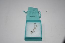 A Tiffany&Co loving heart pendant (RRP £625) (Requires untangling).