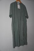 One as new Olive Takuya V Neck Dress one size. Colour: mint.