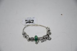 A Pandora bracelet with nine charms.