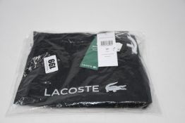 One as new Lacoste Black Man Swimsuit size M (MH6270 00 DY4).