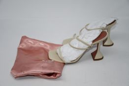 One pre-owned Amina Muaddi beige sandals size 37.