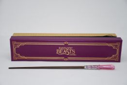 Five boxed as new The Noble Collection wands to include Albus Dumbledore, Leta Lestrange and