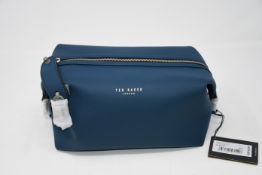 Three as new Ted Baker rubber washbags in navy.