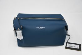 Three as new Ted Baker rubber washbags in navy.