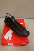 One boxed as new Puma Future 6.1 Netfit FG/GA. Black-white shocking orange. Size UK 7.5 (106179