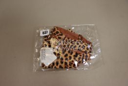 One as new Monday Swimwear Jamaica Top Jaguar size M.
