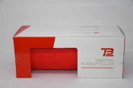 One boxed as new TB12 vibrating pliability roller.