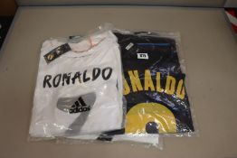 Two as new retro Adidas Ronaldo No 7 football tops (M) and three as new retro Umbro Ronaldo No 8