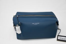 Two as new Ted Baker rubber washbags in navy.