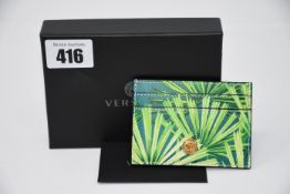An as new Versace card holder wallet.