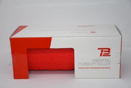 One boxed as new TB12 vibrating pliability roller.