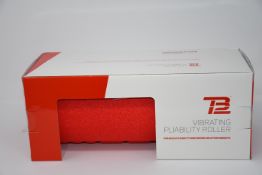 One boxed as new TB12 vibrating pliability roller.