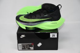 One pair of as new Nike Air Zoom Alphafly Next% size UK 7 (CI9925-400).