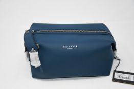 Three as new Ted Baker rubber washbags in navy.