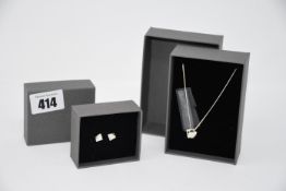 One as new Cos silver necklace with two squared pendants. One as new Cos silver squared earrings.