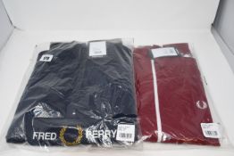 One as new Fred Perry tawny port taped track jacket size L (J6231). One as new Fred Perry Half Zip